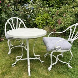 White Metal Outdoor Table And Chairs
