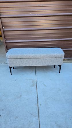 Gray woven storage bench