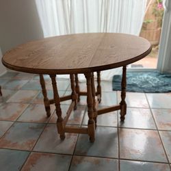 Vintage oak round convertible table
