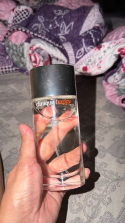 Nearly full bottle of Clinique Happy