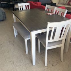 Brand new dinette with four chairs and bench 699