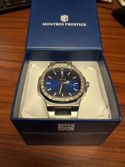 Montres Prestige Watch with Blue Dial