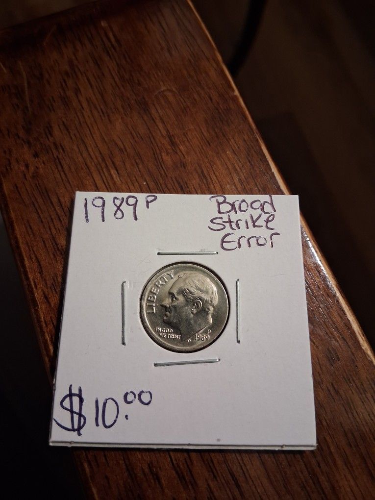 1989-P  BROADSTRIKE DIME ERROR FIRM $10