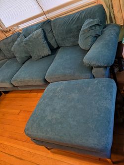 Teal blue sectional couch