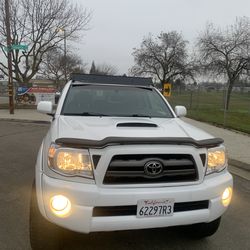 Toyota Tacoma TRD 2009   143000  millas título salvaje trabaja al 💯