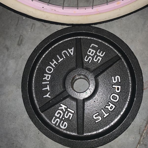 Gym Bench With 2 45 Plates 2 35 Plates And 2 5 Lb Plates. for Sale