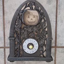 Halloween Radio, Lights Up and Plays Scary Music. Aprox.  13" inches Tall. 