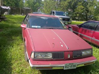1988 Oldsmobile Delta 88 Royal brougham burgundy insides and interior