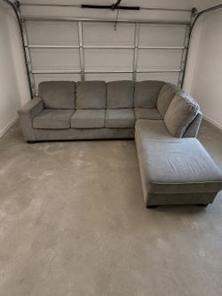 Making space, can deliver sectional gray couch