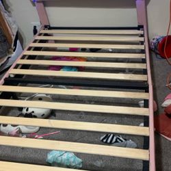 Twin size girls bed headboard lights up comes with remote control purchased in October. All damage is shown overall good condition. 