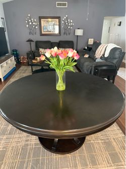 Large 60” round dining table with leaf