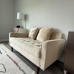 Beige Tufted Loveseat / Small Sofa