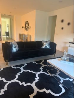 Modern black velvet couch