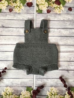 Hand knitted baby romper