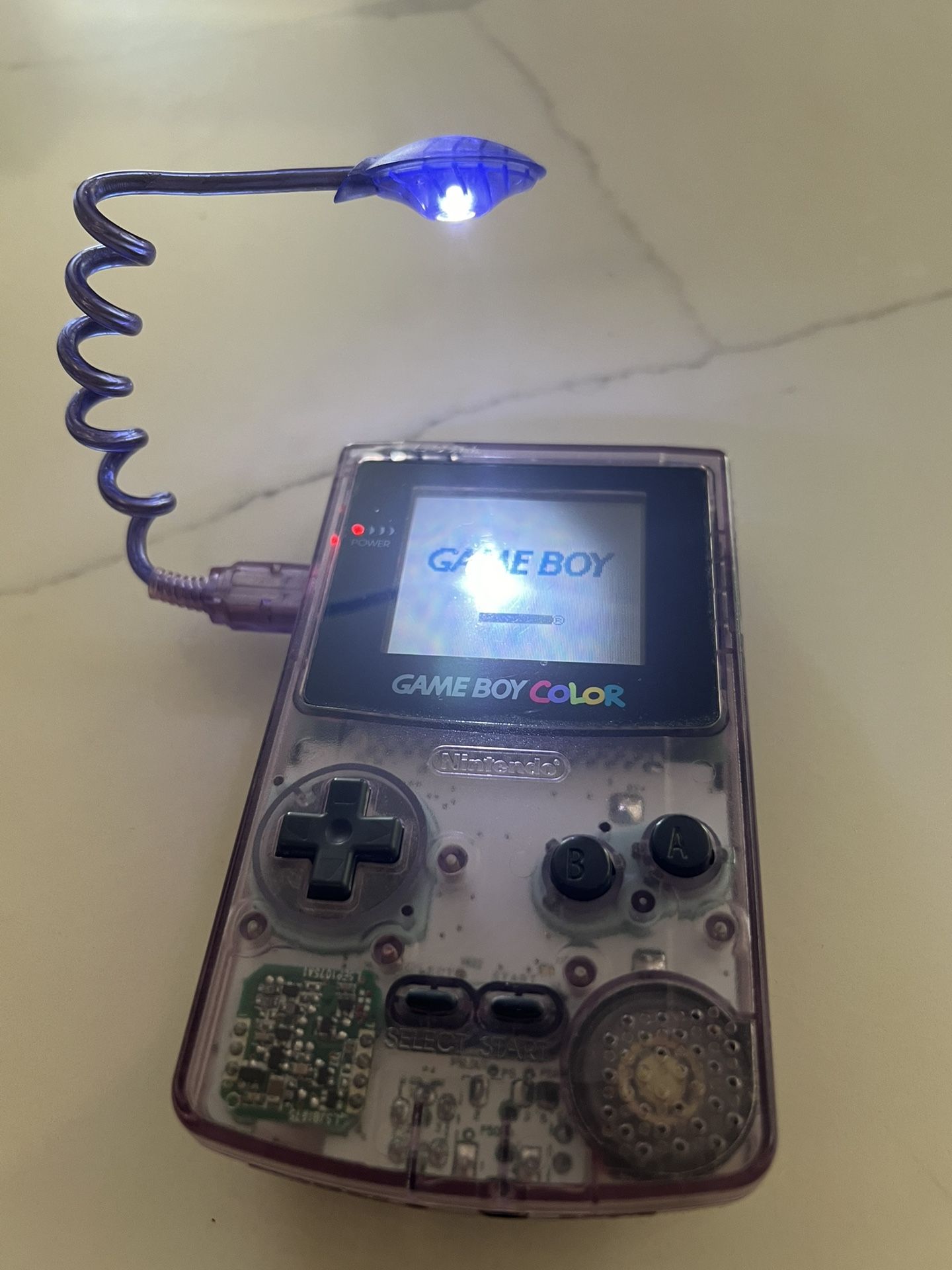 Purple Gameboy Color With Wormlight