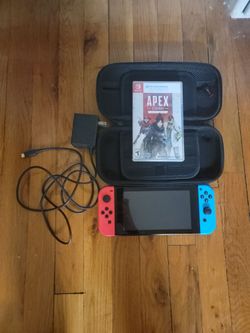 Nitendo Switch With Apex legends, a Case and charger