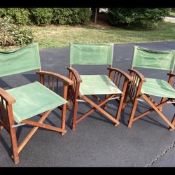 Three green directors chairs 