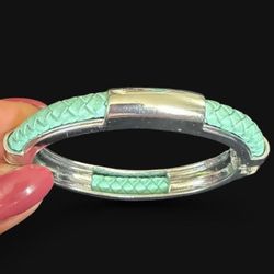 Turquoise braided leather bangle with silver accents