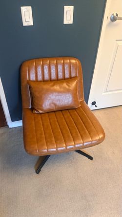 Cognac Faux Leather Swivel Lounge Chair + Pillow