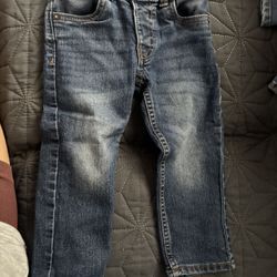 Baby Clothes And Camera 