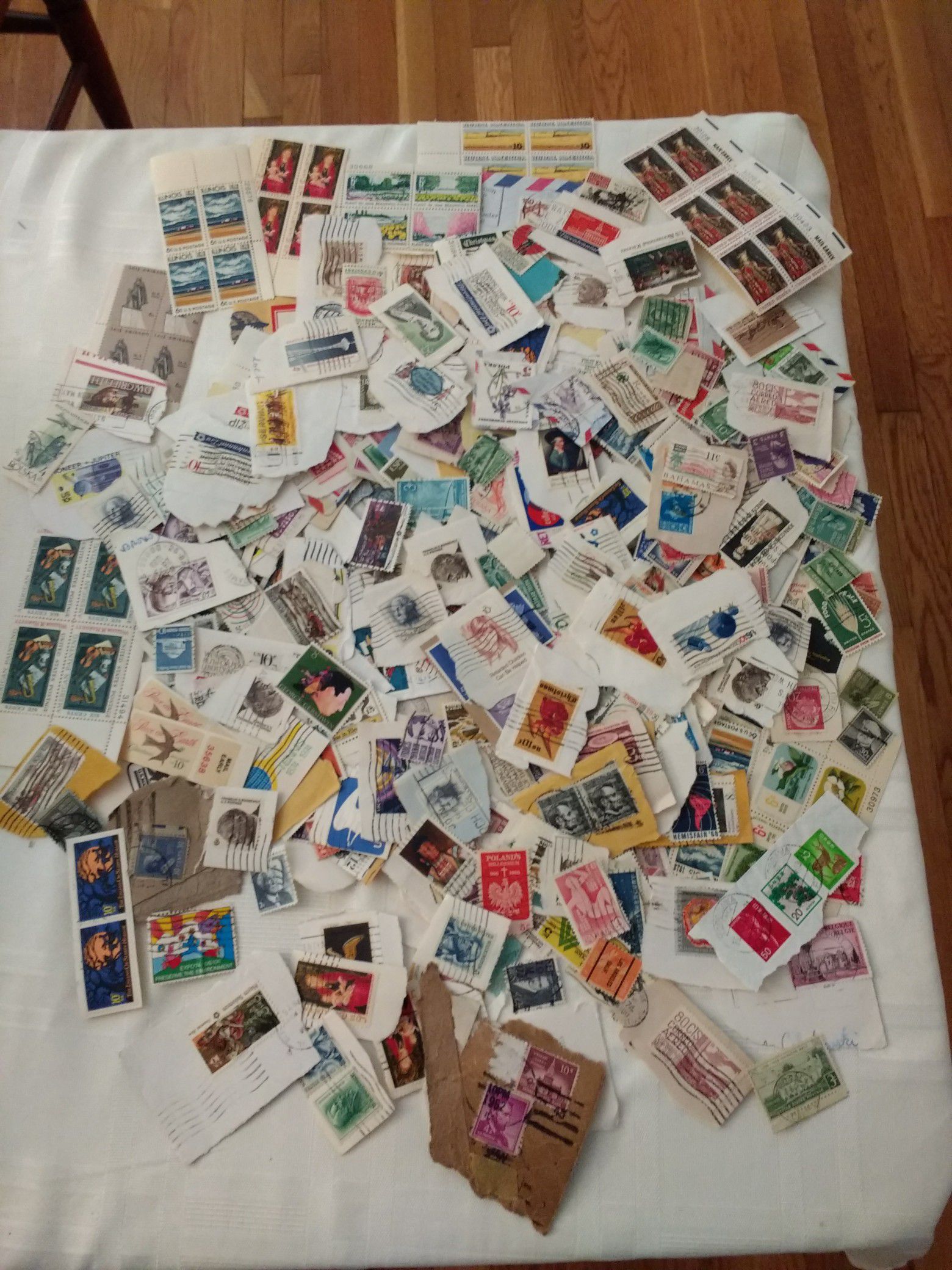 Large lot of worldwide stamps, some never used, mostly vintage