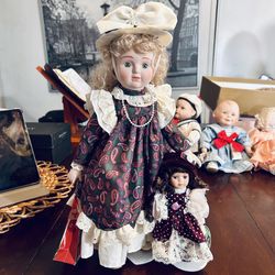 Collectible Porcelain Dolls (set of 2) Tall and Small, by ‘House of Lloyd’ and ‘Petite Collections’