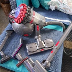Dyson Vacuum Cleaner, a lot of attachments