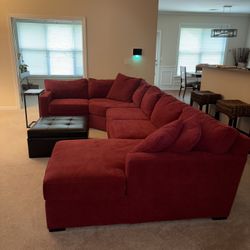 Red Sectional And Artwork