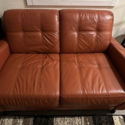 Burnt Orange Faux Leather Love Seat