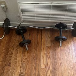 Curling bar to dumbbells hundred pounds in plates varying from 5 pounds to 10 pounds