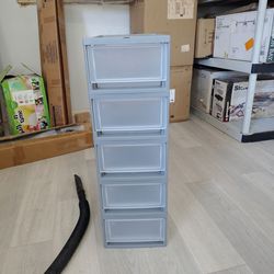 Five plastic drawers 12"x8"