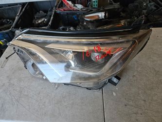 Toyota rav4 left Headlight lid oem