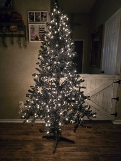Brand new 6 ft black prelit Christmas tree