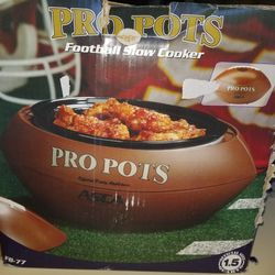 NEW IN BOX PRO POTS FB77 FOOTBALL SLOW COOKER BOX NOT IN GOOD SHAPE ITEM IS NEW.  PICK UP MIDDLEBORO ONLY FINAL SALE 