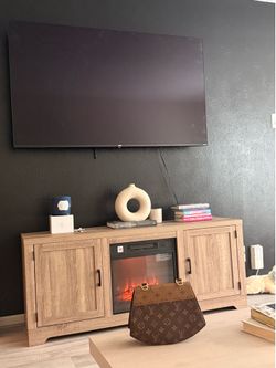 Tv stand and tv  tv is 70 inches