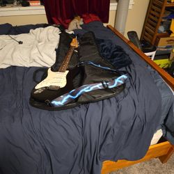 Johnson Electric Gutar