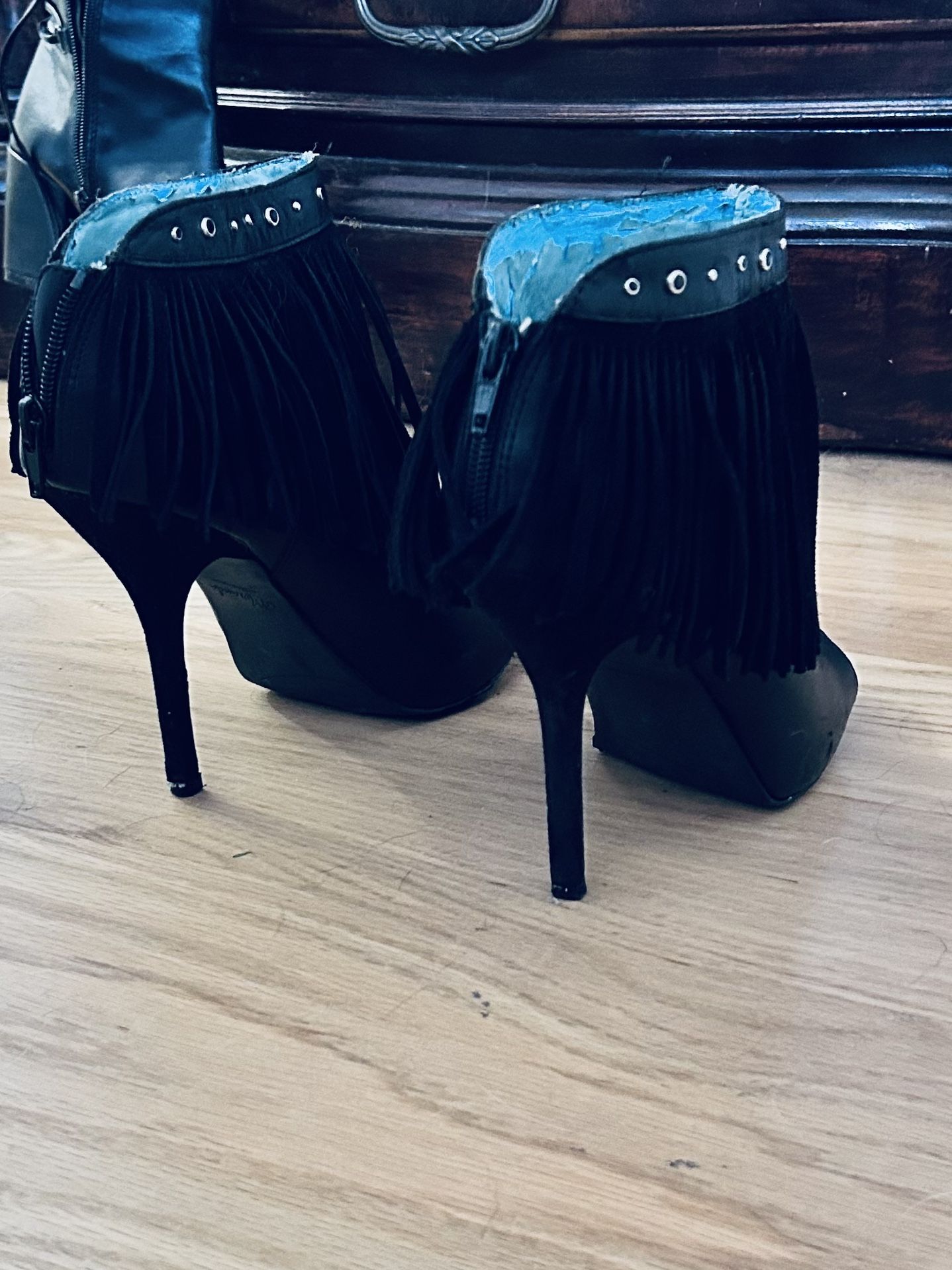 Over the knee boots and fringe heels