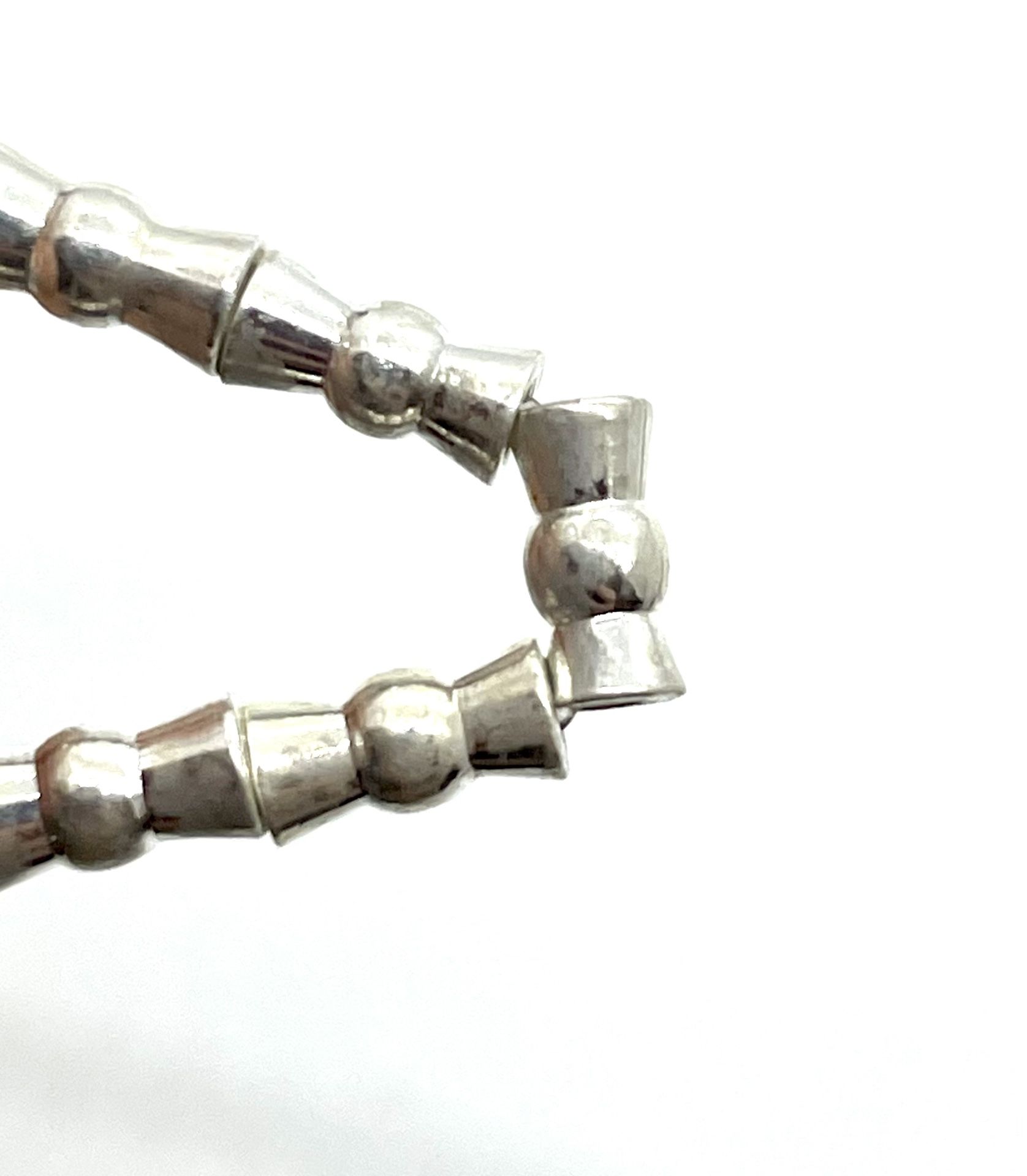 Strand Of Silver Tone Spacer Beads