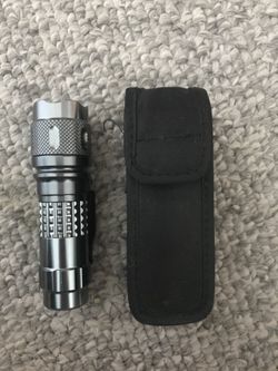 Small flashlight with case