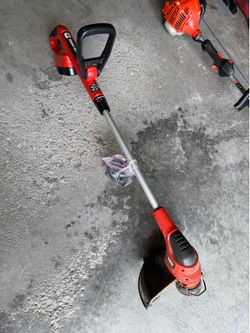 Black & Decker 18V Battery Powered String Weedeater w/ Charger.  Needs a new battery.
