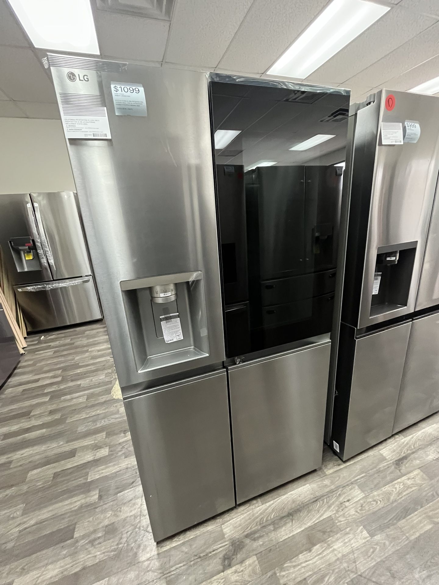 $1099 LG 27 Cu Ft Side by Side Refrigerator with InstaView, One Year Warranty