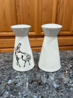 Vintage Ceramic White Porcelain Chinese  pair of Salt and Pepper Shakers.  One shaker has a horse and the other is plain white.  Size approximately 4 