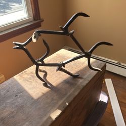 Fish sculpture from railroad spikes