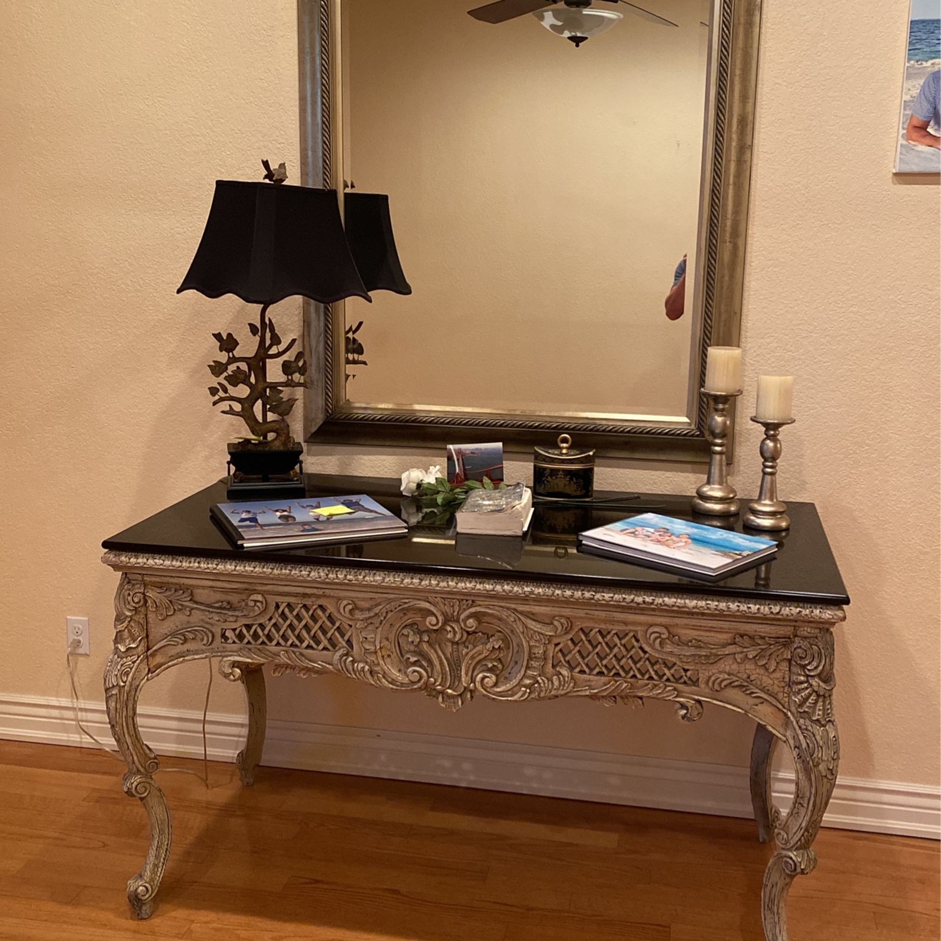 Antique Table With Black Quarts  Mirror And Bird Lamp 