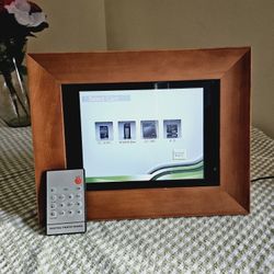 11.5"x9" Wooden Digital Photo Picture Frame with 8.5"×5.5" Screen, Remote Control and User's Manual. Model SP-DPF84M. Has 2 USB ports, takes a standar