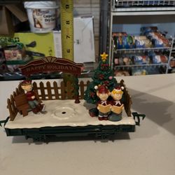 North Pole Express Train With Christmas Tree And Elves