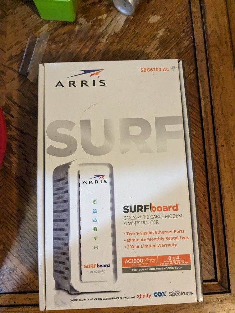 ARRIS Surfboard (8x4) Docsis 3.0 Cable Modem Plus AC1600 Dual Band Wi-Fi Router,