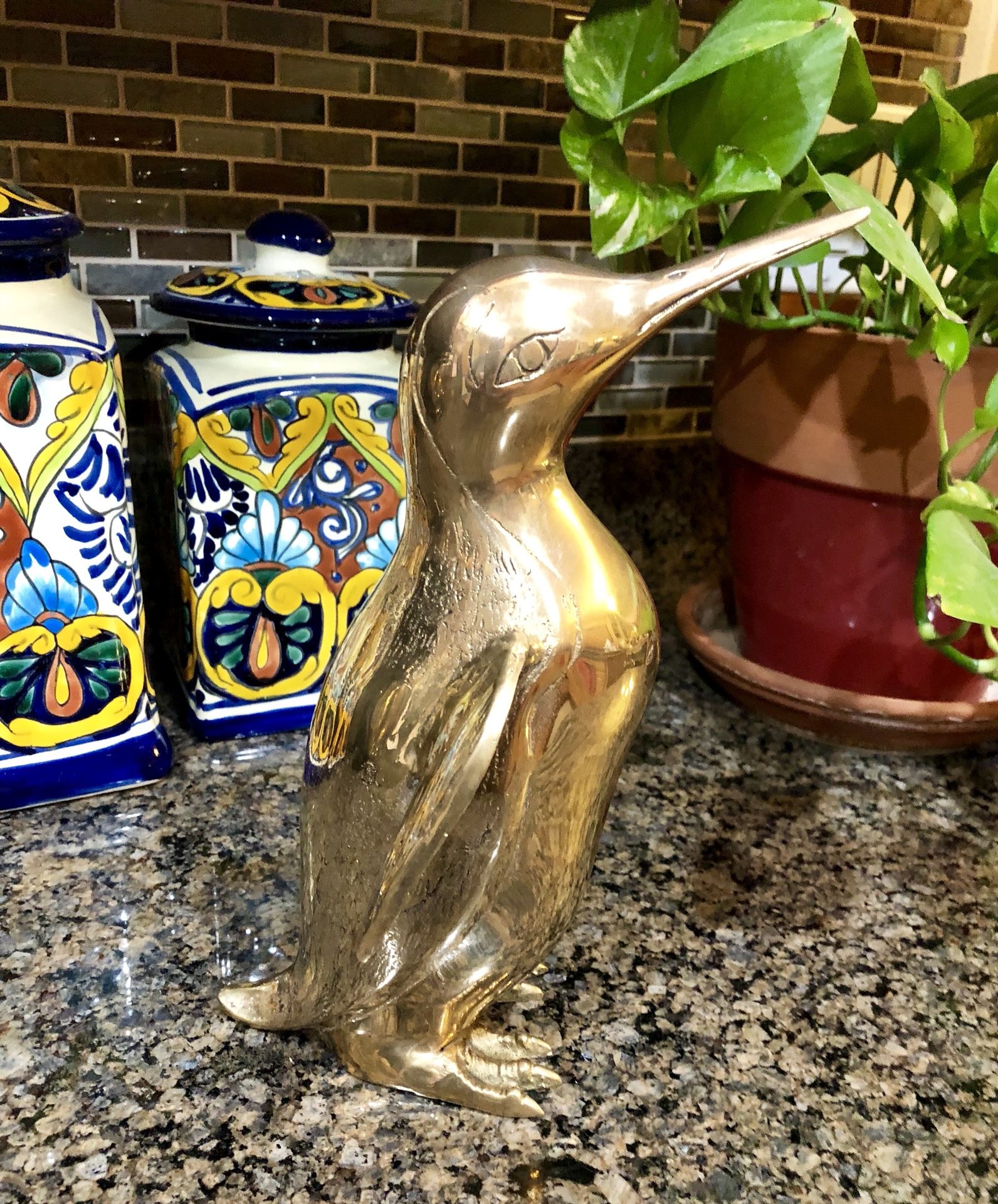Adorable vintage heavy brass penguin sculpture. Beautifully detailed. Excellent condition. Penguin is 10 inches tall. Over $100 or more new.