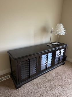 Dark Wood TV Console with Shutter Doors