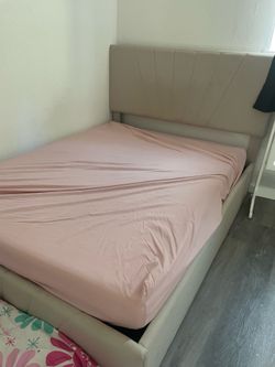 Full-size bed with mattress